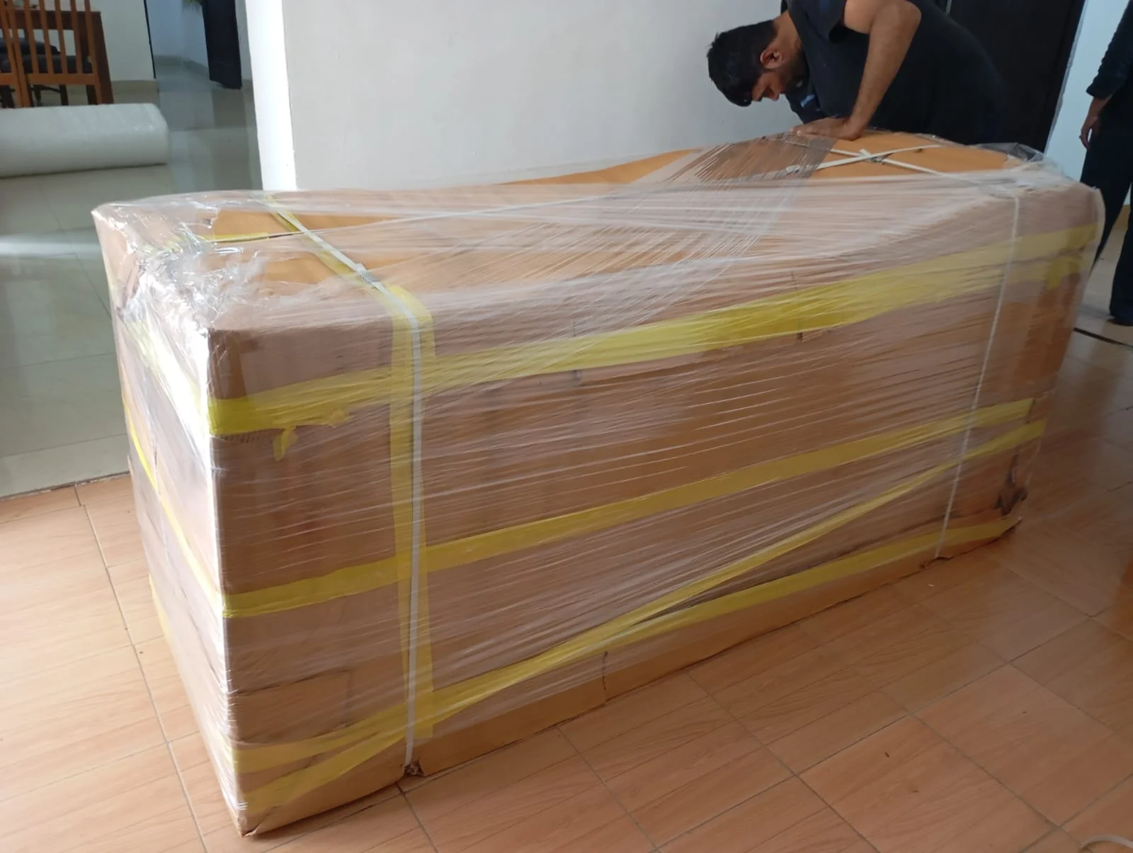 Wrapping a wide furniture unit